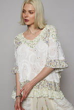 Off White Round neck short sleeve floral textured woven POL top