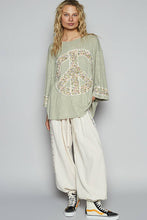 Sage 3/4 sleeve round neck floral peace patch knit POL top