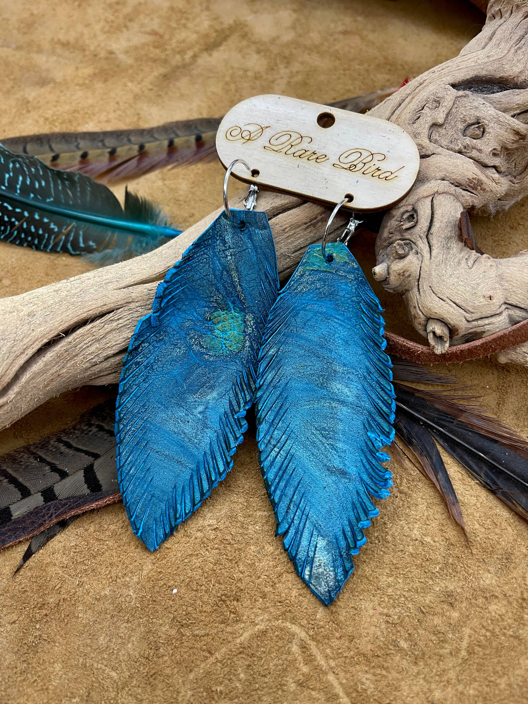 Hand-cut Turquoise Swirl Leather Feather Rare Bird Earrings