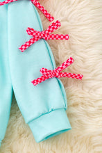 Merry Grinchmas Kids aqua long sleeve sweatshirt.