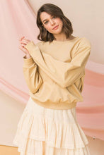 Tan sweatshirt top