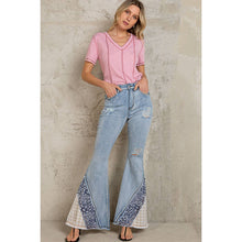 Denim Flare cut asymmetrical patch detail POL Jeans