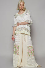 Off White Round neck short sleeve floral textured woven POL top