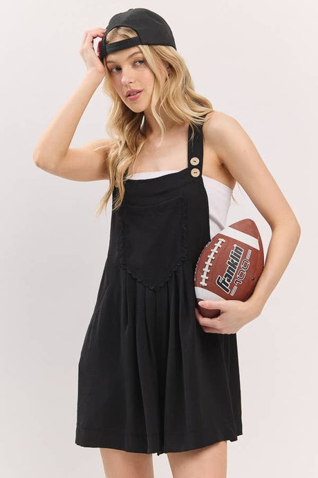 Black Scallop Pocket Strap Romper
