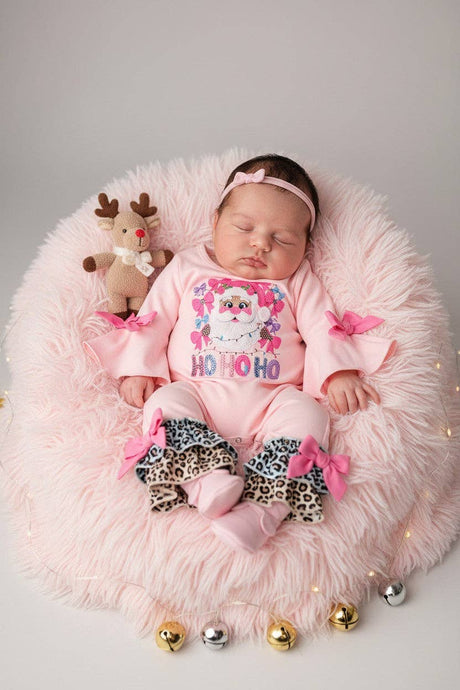 Pink santa printed baby romper with bell sleeves and snaps