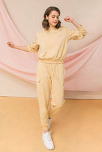 Tan sweatshirt top