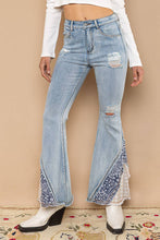 Denim Flare cut asymmetrical patch detail POL Jeans