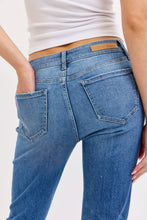 Mid Rise Flare with Distressed Raw Hem Cello Jeans