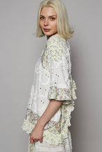 Off White Round neck short sleeve floral textured woven POL top