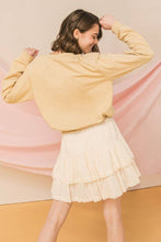 Tan sweatshirt top