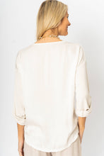 White sweater with rhinestone
