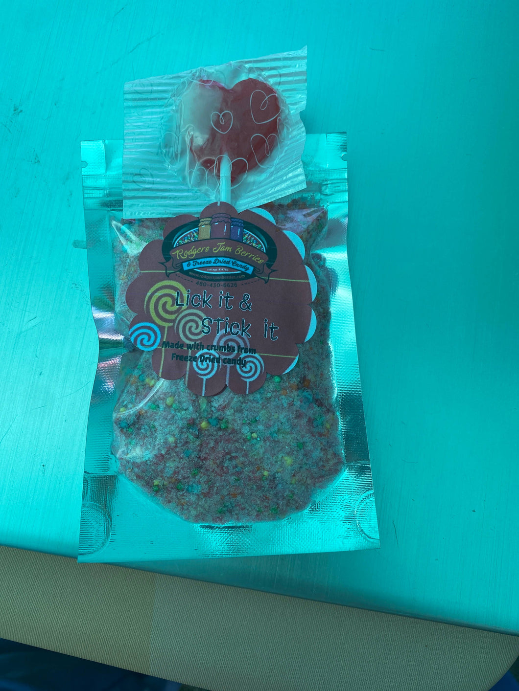 Freeze dried candy dust with sucker